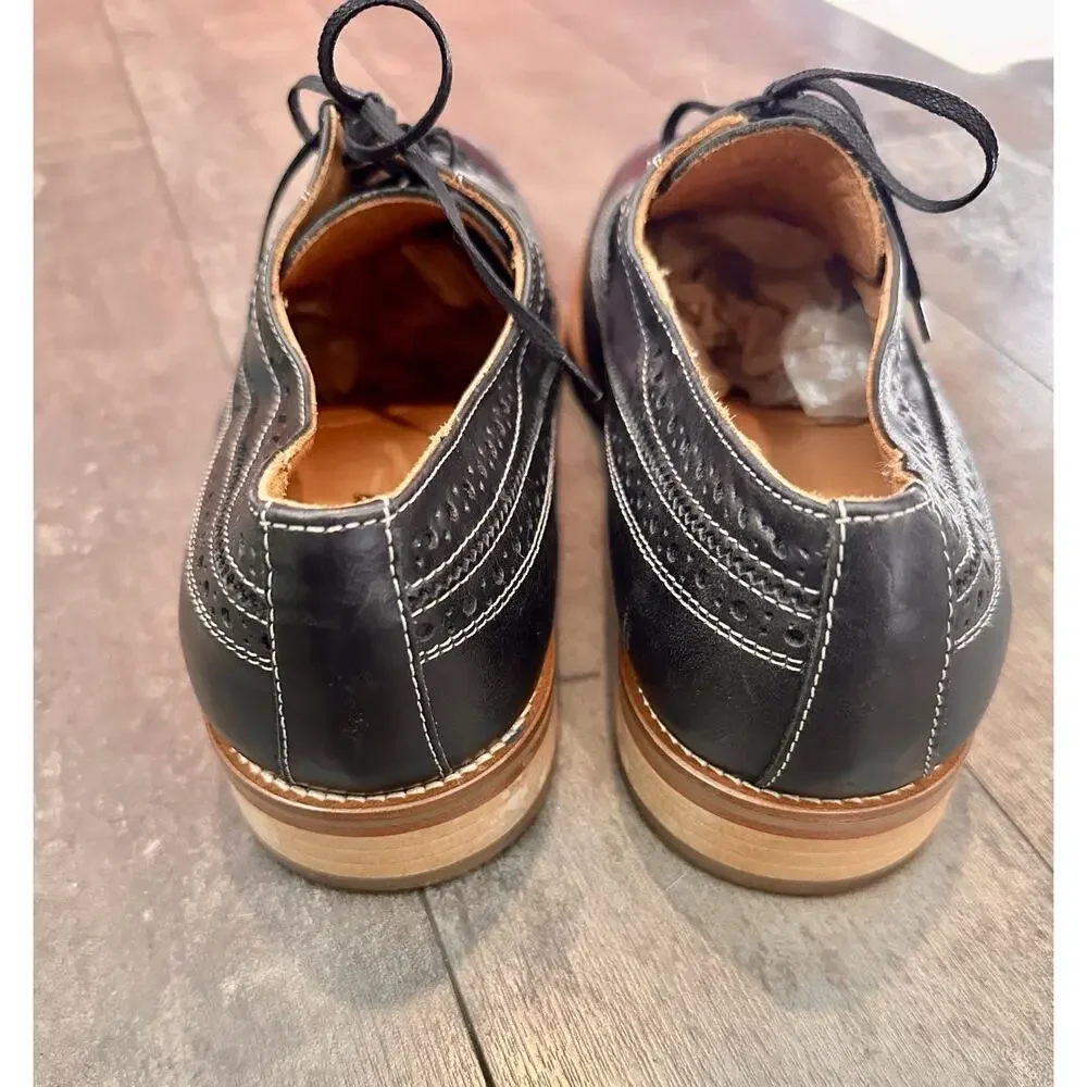 Johnston & Murphy Mens Conrad Wingtip Black Leather Oxford Shoes.